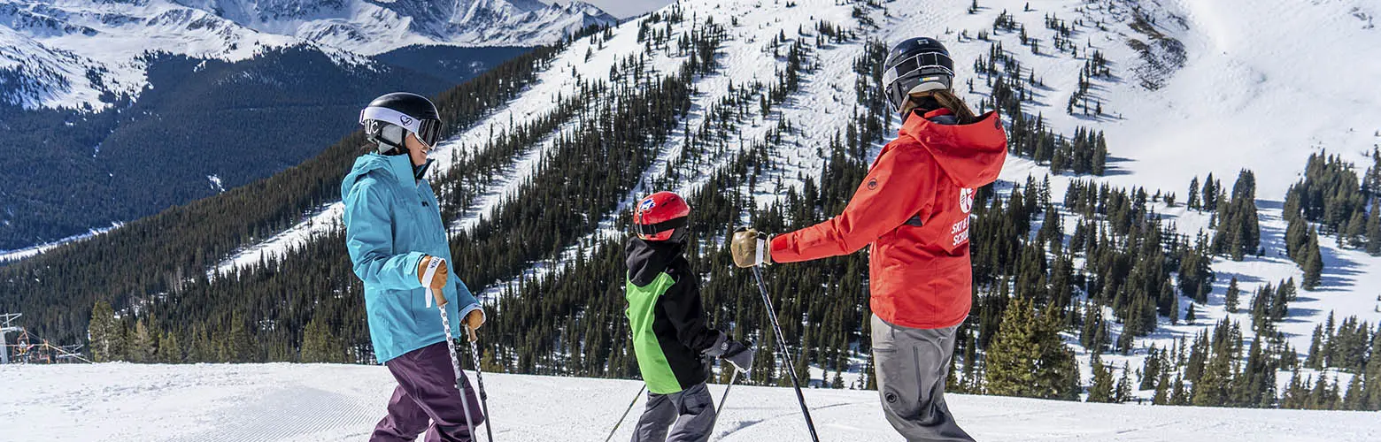 mom and son taking a ski lesson in copper bowl