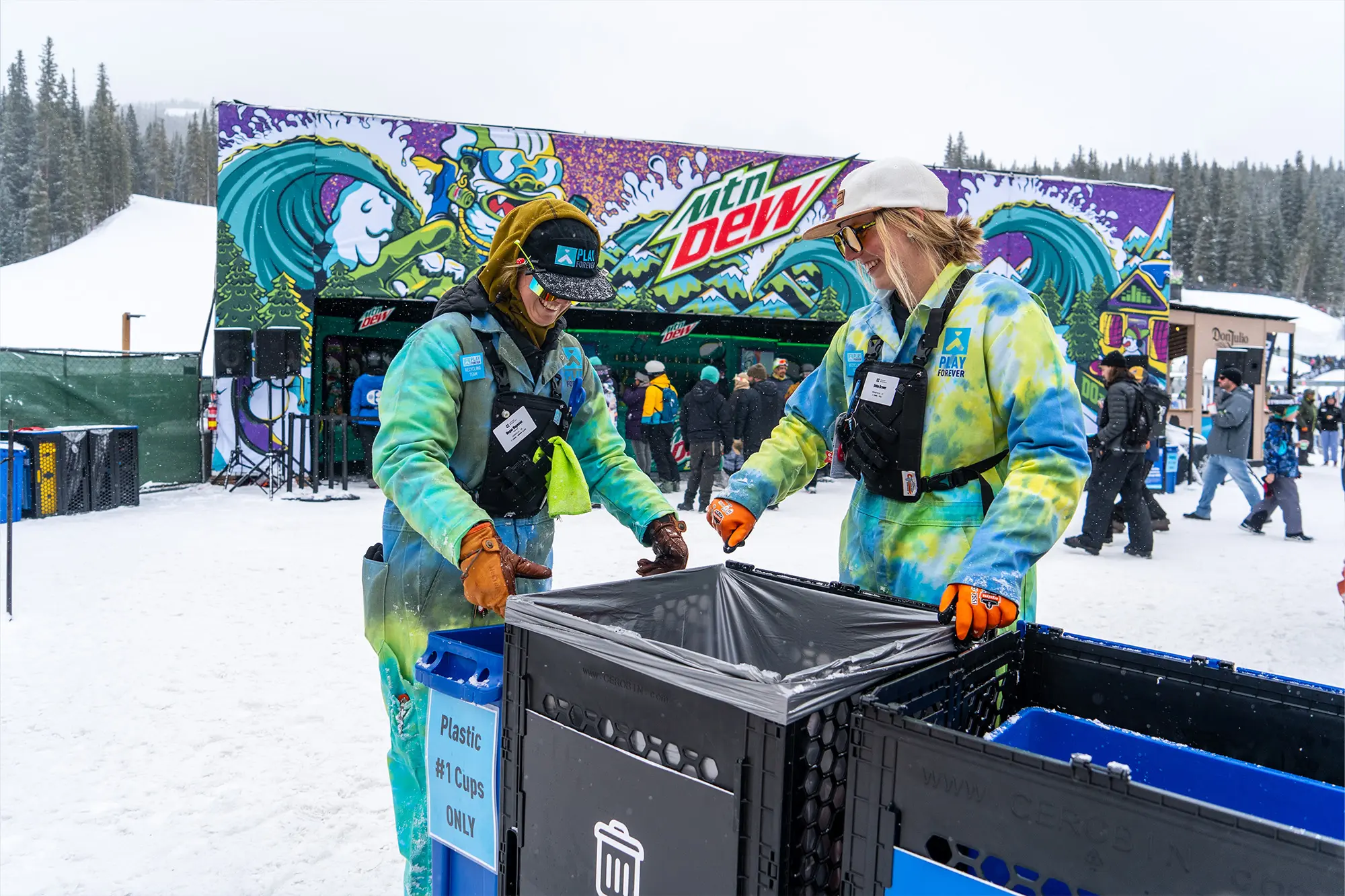 emptying trash at dew tour