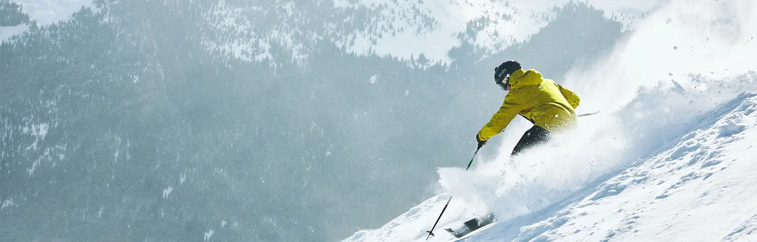 Skiing powder on a sunny day