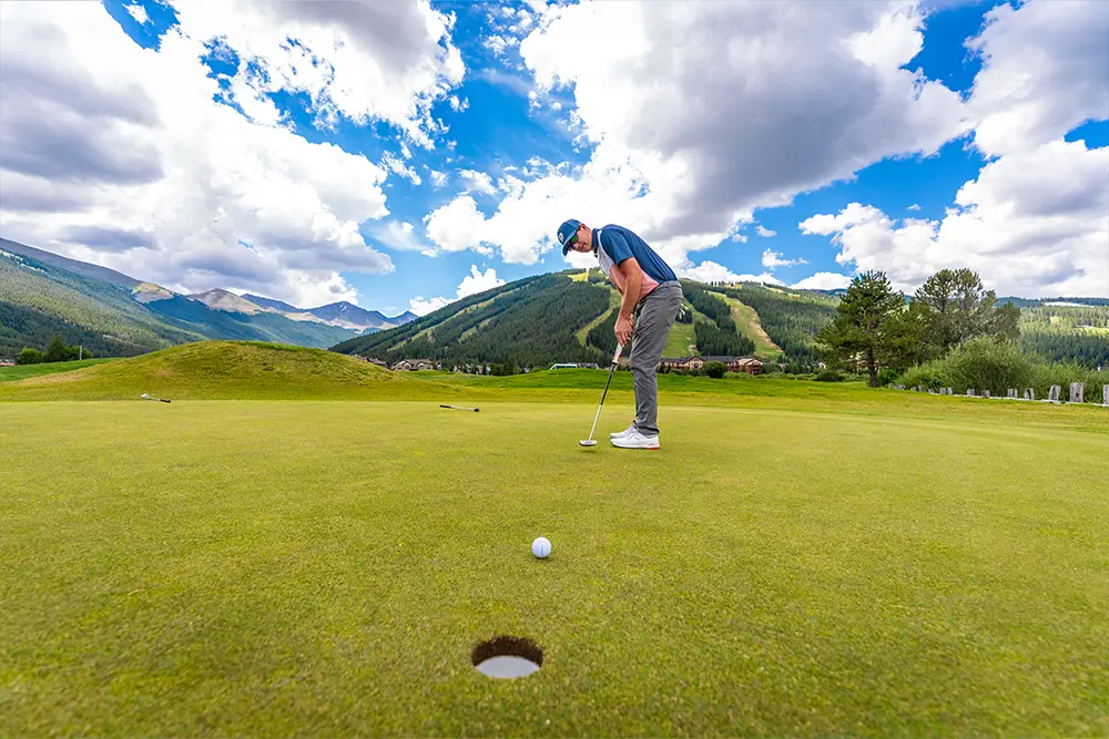 Man putting at Copper Creek Golf Course