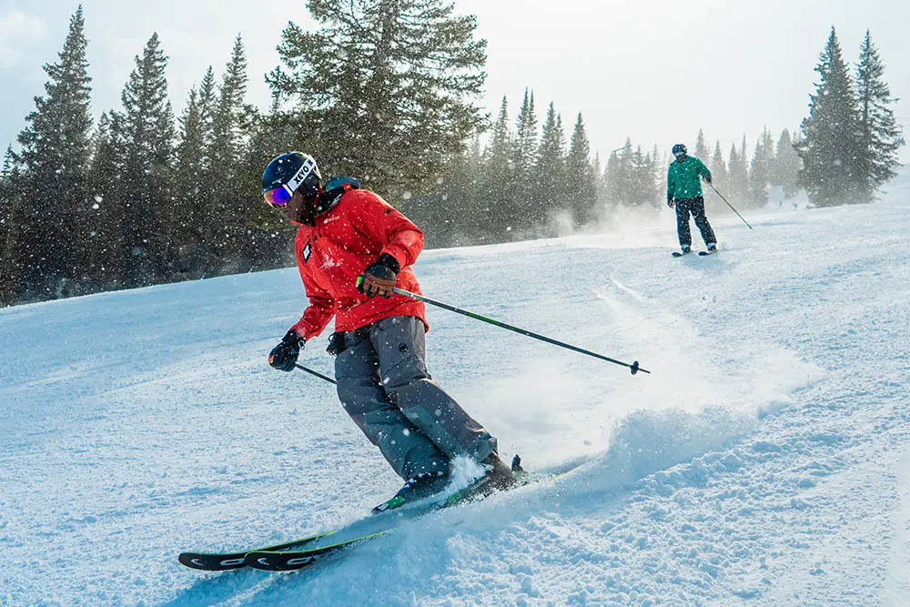 ski instructor leading a private adult lesson